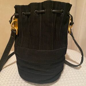 Sharif Shoulder Bag. Black rib ottoman fabric w leather trim & Gold hardware.